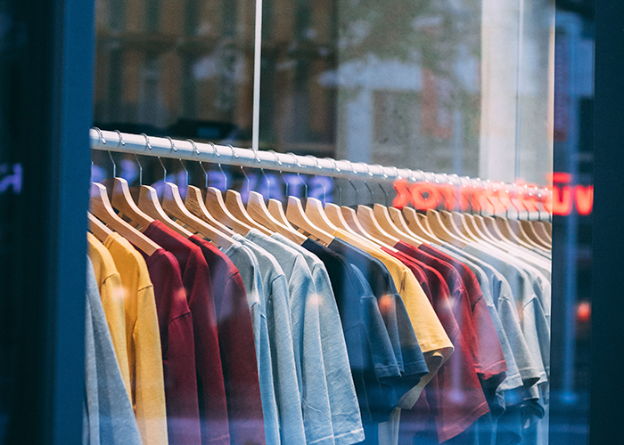 A shopper in a retail aisle